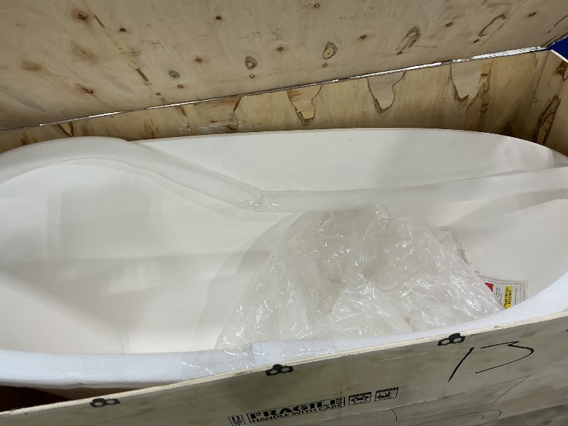 Photo 1 of ***MINOR DAMAGE ON RIM*** WOODBRIDGE 67 in. x 29.5 in. Stone Resin Luxury Contemporary Solid Surface Freestanding Bathtub in Matte White