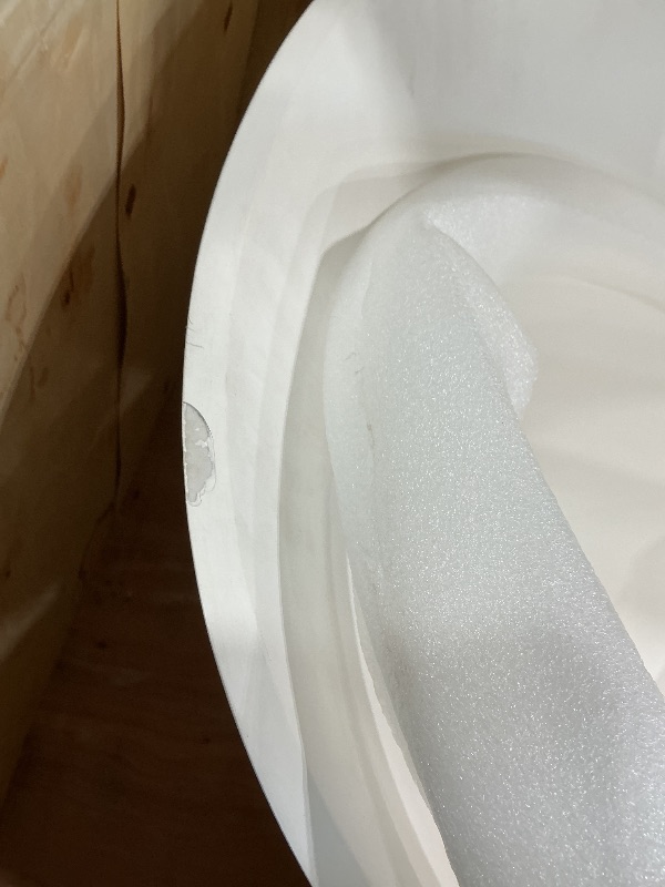 Photo 1 of ***MINOR DAMAGE ON RIM*** WOODBRIDGE 67 in. x 29.5 in. Stone Resin Luxury Contemporary Solid Surface Freestanding Bathtub in Matte White