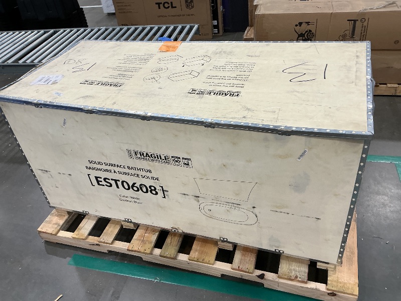 Photo 1 of ***MINOR DAMAGE ON RIM*** WOODBRIDGE 67 in. x 29.5 in. Stone Resin Luxury Contemporary Solid Surface Freestanding Bathtub in Matte White