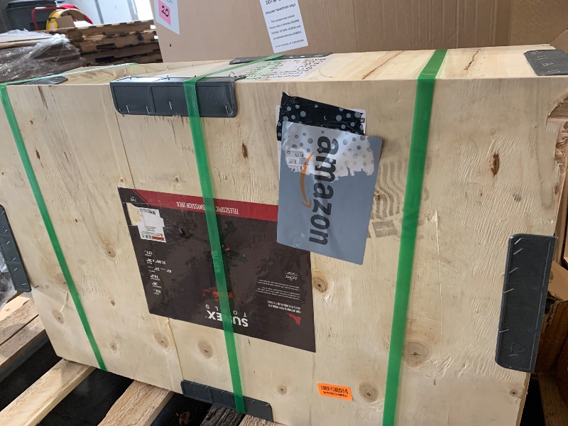 Photo 1 of  Sunex Tools 7793B 1,000 lb Telescopic Transmission Jack, Hydraulic, Foot Pump Operated, Tilt Saddle with Chain Tie-Down, 74.2 in Max Height