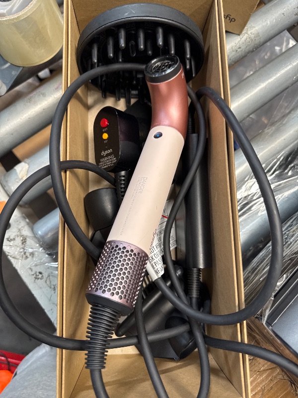 Photo 1 of **FOR PARTS, ITEM IS NONFUNCTIONAL**
Dyson Supersonic r™ Hair Dryer in Ceramic Pink and Rose Gold
