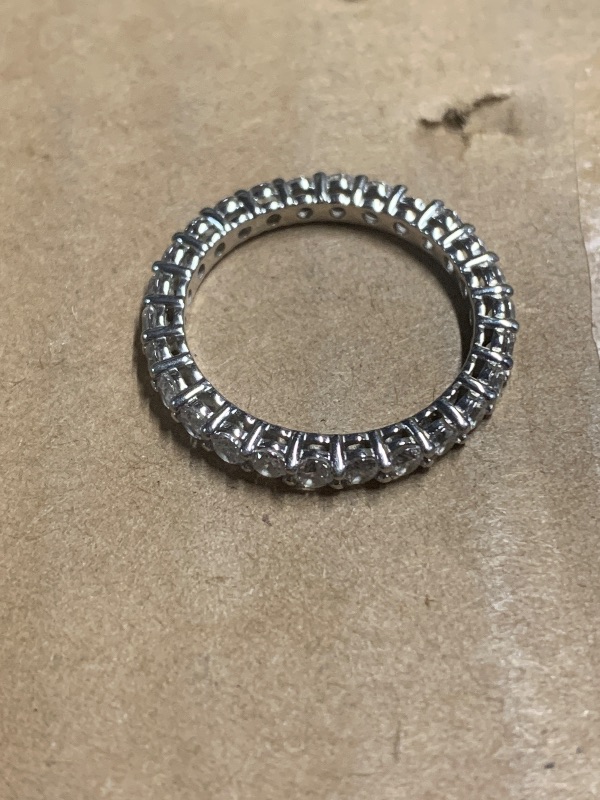 Photo 1 of  *MISSING ONE SETTING* SEE PHOTO* Amazon Essentials Platinum-Plated Sterling Silver All-Around Band Ring set with Round Infinite Elements Cubic Zirconia (1 cttw), Size 8 (previously Amazon Collection)