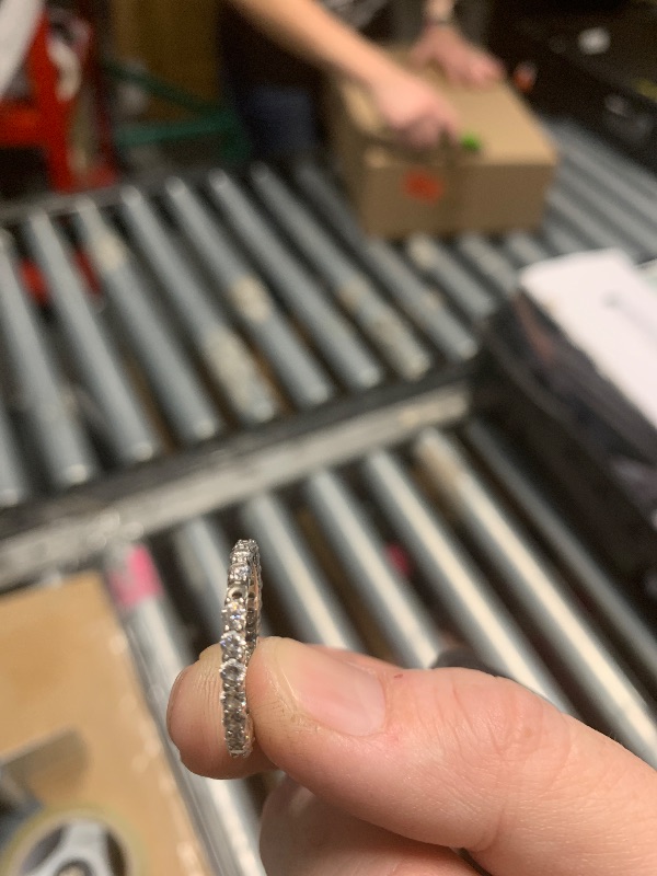 Photo 1 of  *MISSING ONE SETTING* SEE PHOTO* Amazon Essentials Platinum-Plated Sterling Silver All-Around Band Ring set with Round Infinite Elements Cubic Zirconia (1 cttw), Size 8 (previously Amazon Collection)