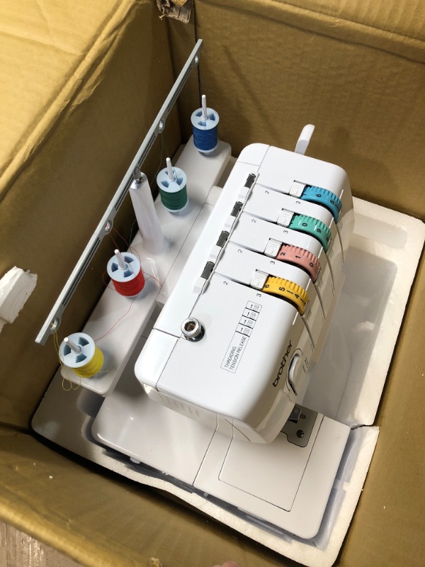 Photo 1 of (PARTIAL SET) (UNTESTED) Brother Serger, 1034D, Heavy-Duty Metal Frame Overlock Machine, 1,300 Stitches Per Minute, Removeable Trim Trap, 3 Included Accessory Feet, White