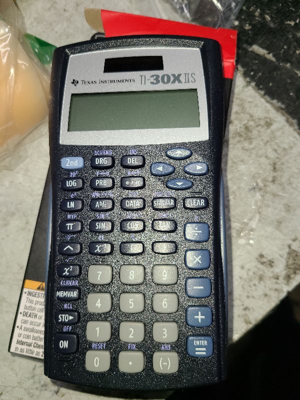 Photo 1 of Texas Instruments TI-30XIIS Scientific Calculator, Black with Blue Accents