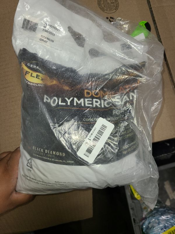 Photo 1 of 10 Pound Titanium Gray DOMINATOR Polymeric Sand with Revolutionary Ceramic Flex Technology for Stabilizing Paver Joints/Gaps, 1/8” up to 4”, Professional Grade Results