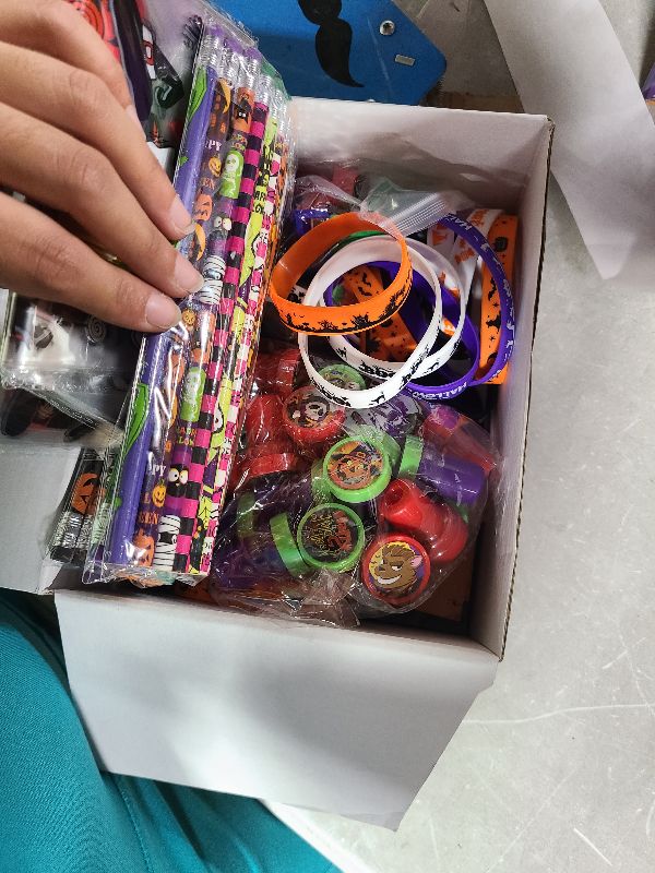 Photo 1 of 202PPCS Halloween Party Favors,Stationery Set Goodie Bags Stuffers for Kids School Classroom Prizes Trick or Treat Gifts Bags Fillers include Pencils,Erasers,Rulers,Halloween Stickers,Stamper,Notepads