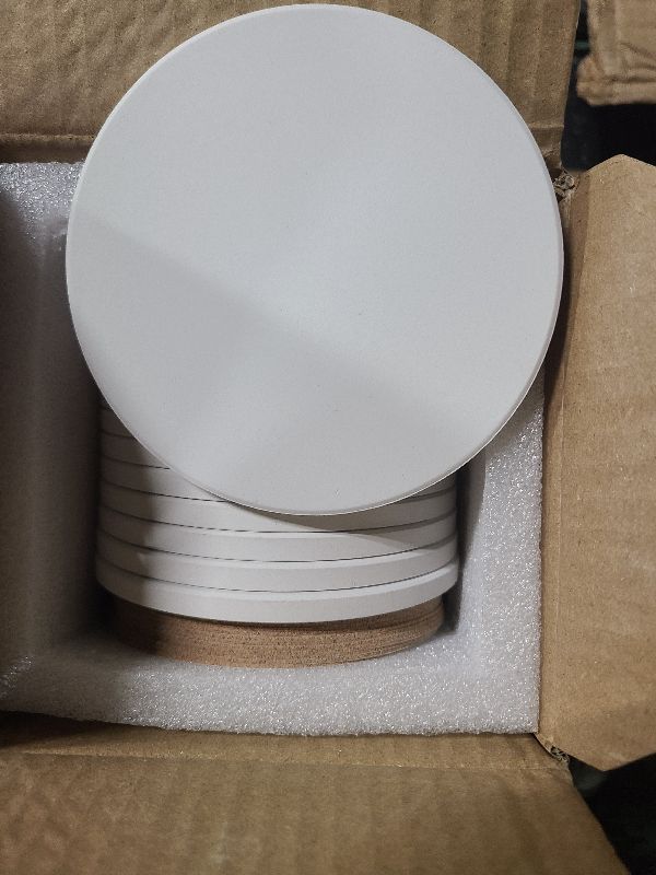 Photo 1 of 12 Round Unglazed Ceramic Tiles for Crafts with 12 Cork Pads for DIY Coasters, Acrylic Pouring, Alcohol Ink, White Blank Coasters for Painting, Art Projects (4.2 in)