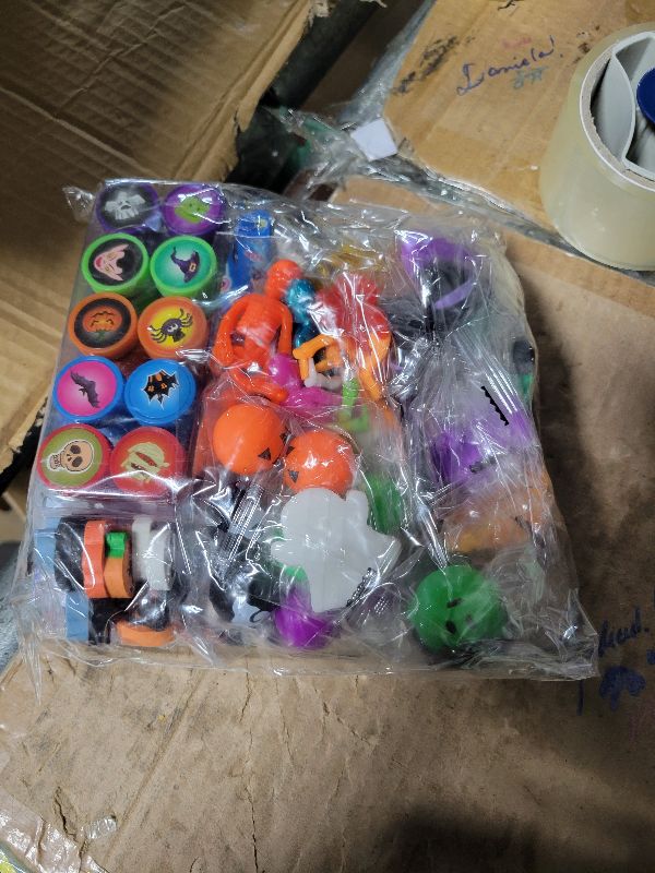 Photo 1 of 200PCS Halloween Goodie Bag Stuffers Stationery Set, Assorted Halloween Party Favors for Kids Toys Bulk Non Candy Halloween Treats Pencils, Eraser, Stamps, Slap Bracelets
