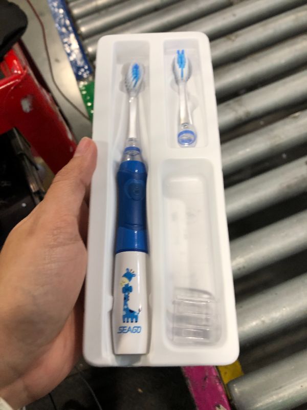 Photo 1 of ***MISSING PARTS***
SEAGO Kids Electric Toothbrush with 2 Mins Brushing Timer and 4 Replacement Bursh Heads, Rainbow LED Light Make Brushing Fun, Blue Color Boys Battery Powerd Toothbrush for 4-12 Years Old?SG-977