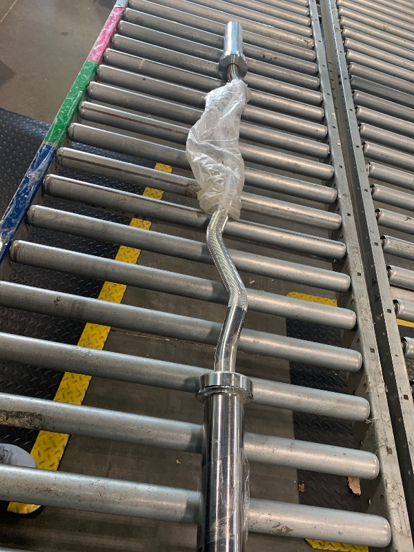 Photo 1 of ***SIMILAR ITEM**** Amazon Basics Olympic 2-Inch Curl Barbell Bar, 47", Chrome