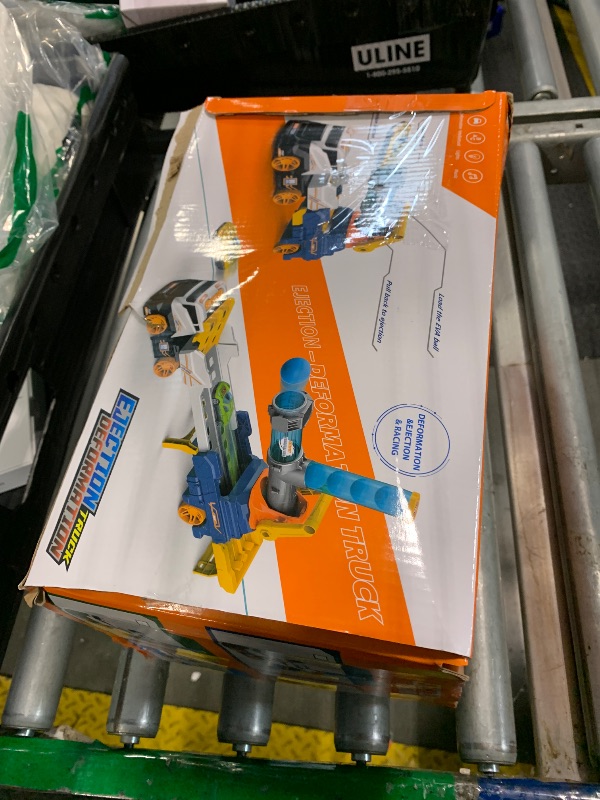 Photo 1 of ***MISSING PARTS*** Dwi Dowellin Truck Toys for Kids, 28" Large Car Toys Include 4 Racing Cars+6 Ball, with Light & Sounds, Eejection&Shooting Transport Cars Toy, Gifts for Boys Girls-Green