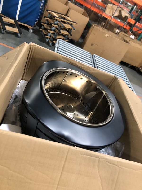 Photo 1 of ****BEATEN AND BENT ON ONE SIDE, AS SHOWN IN THE IMAGE****TIKI Patio Fire Pit Bundle – 25-Inch Smokeless Wood Burning Outdoor Fire Pit for Backyard, Patio, Deck & Garden with Removable Ash Pan, Stand & Weather-Resistant Cover – Modern Black Stainless Stee