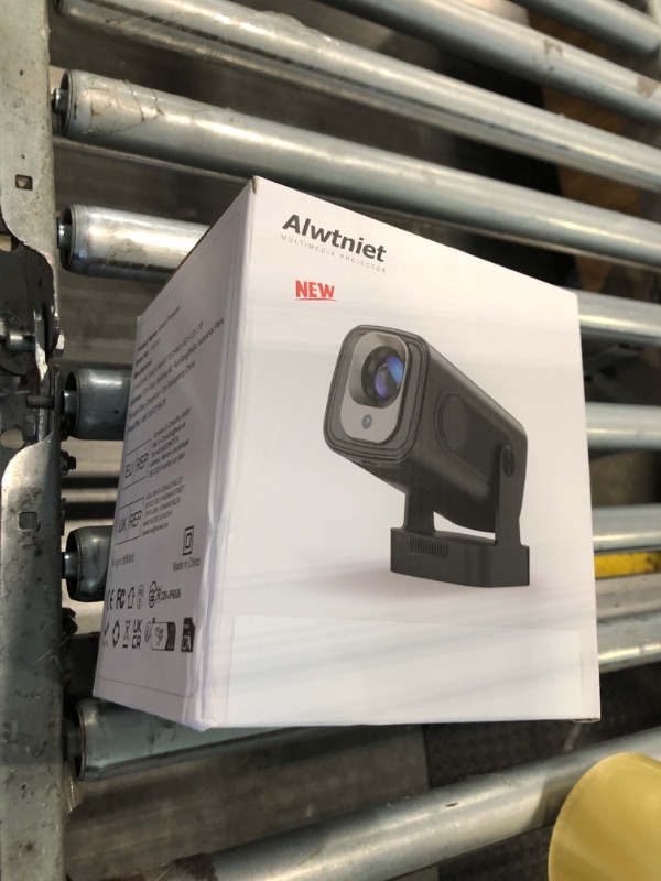 Photo 1 of ?Auto Focus &1080P?Alwtniet Mini Portable Projector, 4k Support Smart Proyector with Wifi and Bluetooth For Outdoor, 5W Speaker, Built in Apps,Home Theater, Bluetooth Movie Projector (Black)