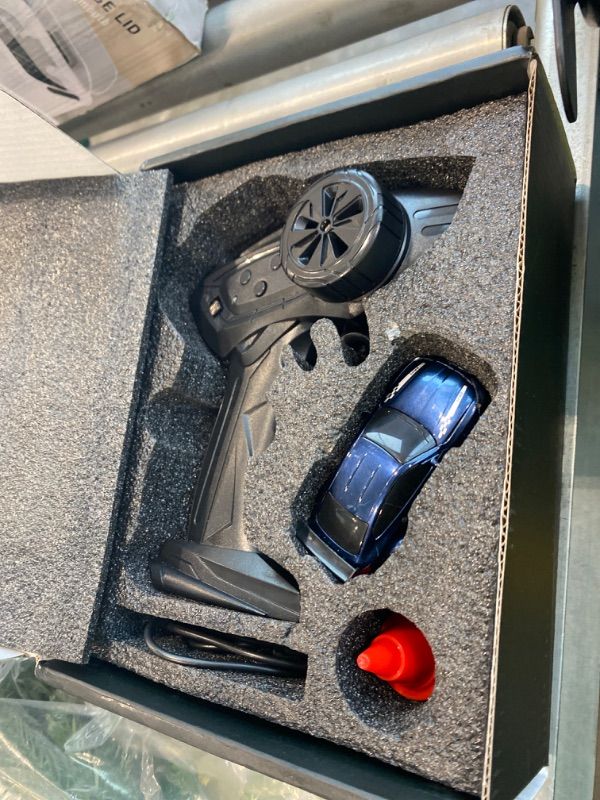 Photo 1 of *USED*
BEACONDESI Desktop Mini Size 1:64 Scale 4WD RC Drift Car with Skill-Building Drift Control & LED Lights – Learn Drift Techniques, Fast Charge, Adjustable Throttle, 2.4GHz Remote – Blue