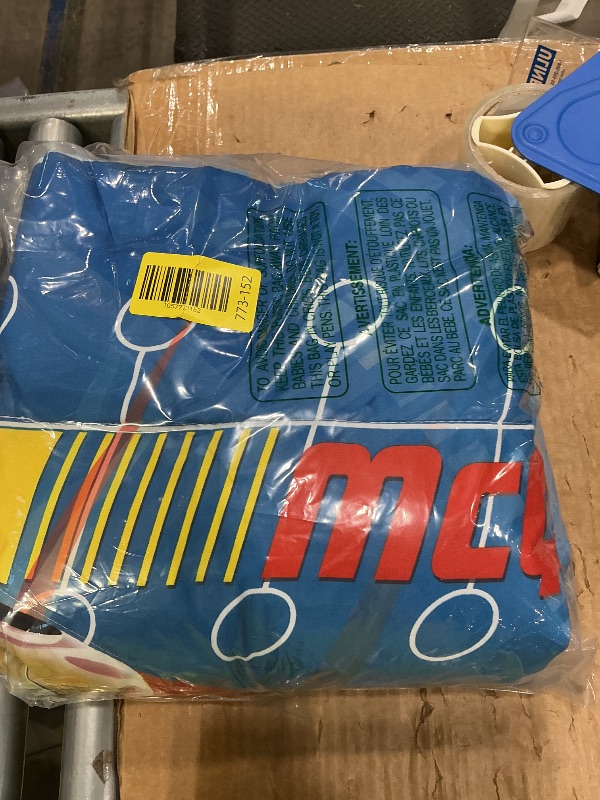 Photo 1 of Disney Cars Piston Cup Circuit Blue, Red, and Yellow, Lightning McQueen and Mater 4 Piece Toddler Bed Set - Comforter, Fitted Bottom Sheet, Flat Top Sheet, and Reversible Pillowcase