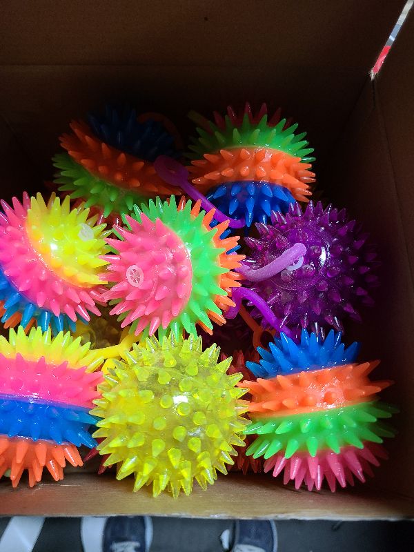 Photo 1 of 16 Pieces Light Up Ball for Kids Fidget Spiky Ball Stress Relief Balls LED Flashing Basketball with Rope Rubber Flash Squeaky Ball for Adults, Teens and Children(Multi Color, Spiky Ball)