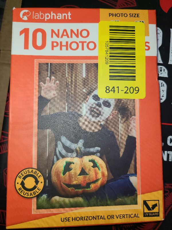 Photo 1 of 10 PCS Nano Adhesive Transparent Photo Holder Frames - Removable and Reusable Clear Picture Frame for Displaying Treasured Memories - 4 x 6 Inch Multipurpose Photo Sleeves with Strong Sticky Backing