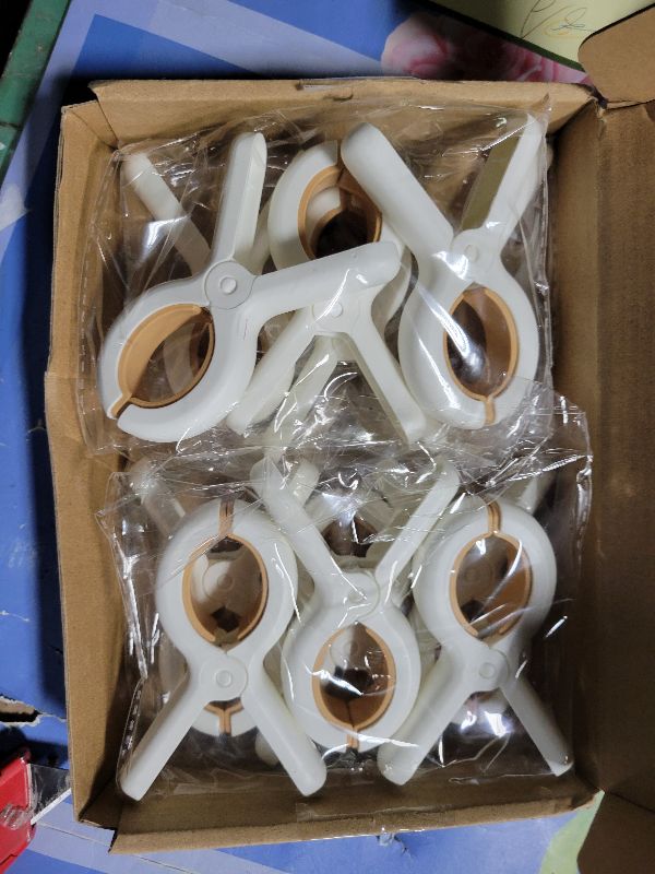 Photo 1 of 12 Pack Plastic Clothes Pins with Strong Anti-Rust Springs,Heavy Duty Beach Towel Clips,Laundry Clothespins to Keep Your Towel, Clothes, Blankets to Dry on Clothesline and Hanging Rack