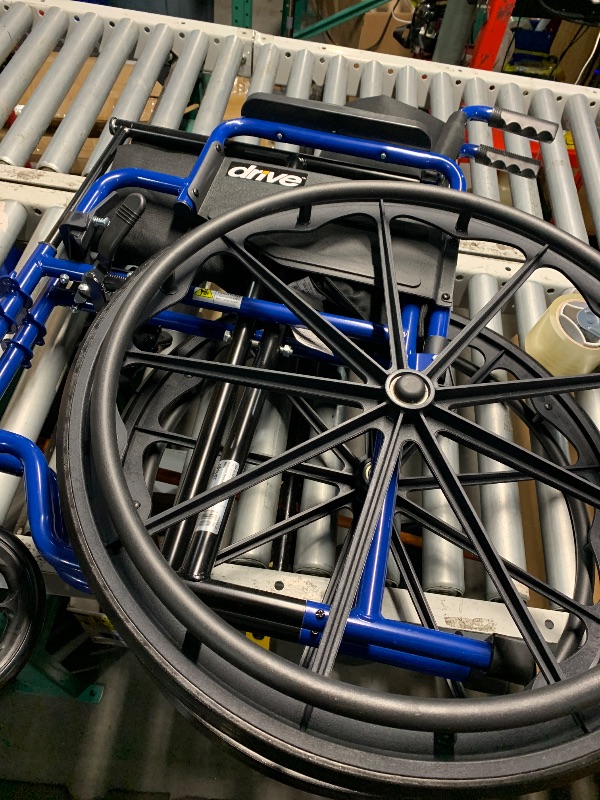 Photo 1 of (used item)(incomplete) Drive Medical Blue Streak Wheelchair with Flip Back Desk Arms, Elevating Leg Rests Folding