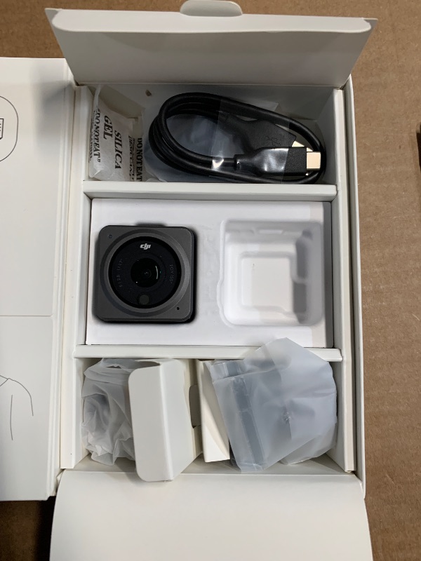 Photo 1 of **Parts Only**
DJI Action 2 Dual-Screen Combo (32GB) WITHOUT Magnetic Protective Case, 4K Action Camera with Dual OLED Touchscreens, 155° FOV, Magnetic Attachments, Stabilization, Underwater Camera Ideal