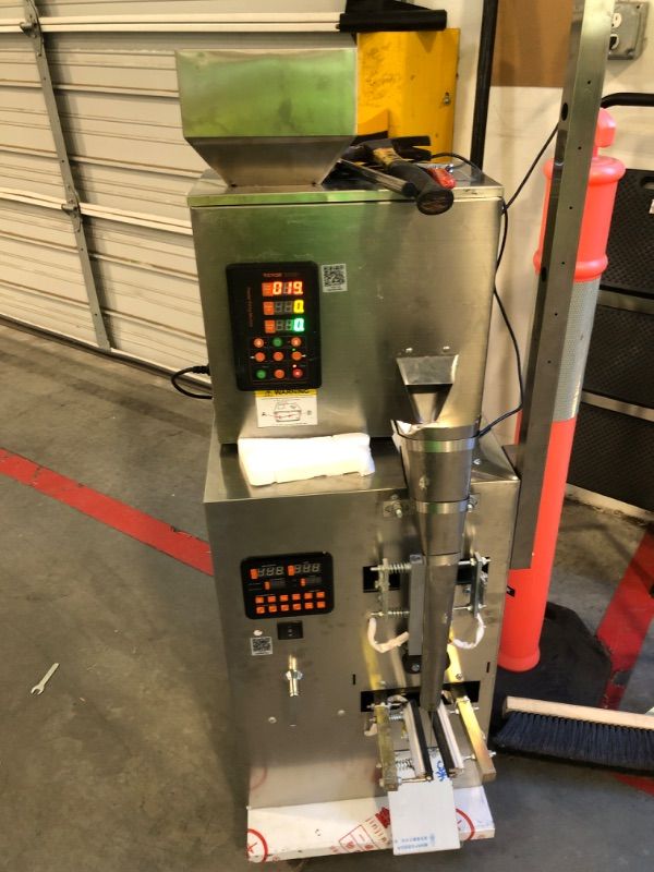 Photo 1 of ***MISSING ONE POWER CORD AND A COUPLE RODS***POWERS ON***VEVOR
Automatic Particle Packaging Machine 0.002-0.22 lbs. Multi-Function Pouch Powder Filler Machine 49 in. H (1-100g)