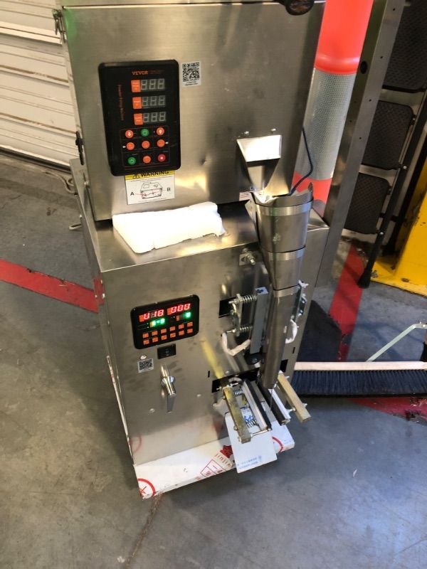 Photo 1 of ***MISSING ONE POWER CORD AND A COUPLE RODS***POWERS ON***VEVOR
Automatic Particle Packaging Machine 0.002-0.22 lbs. Multi-Function Pouch Powder Filler Machine 49 in. H (1-100g)