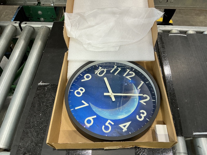 Photo 1 of ***READ CLERK NOTES*** JoFomp LED Glow in Dark Wall Clock, 12 Inch Silent, Blue Moon Night Light for Living Room Decor, Sound Control Glow in The Dark for Bedroom