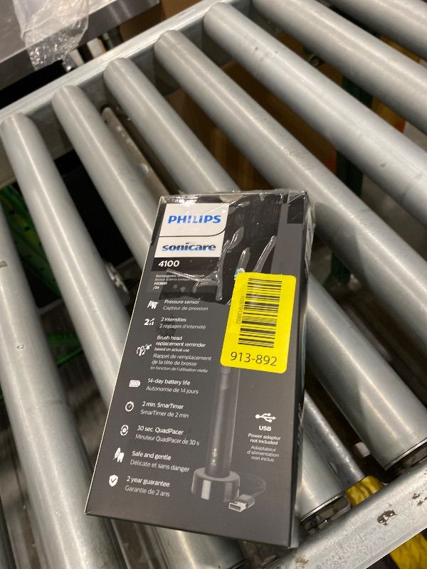 Photo 1 of **Missing Part - Brush Head Missing**
Philips Sonicare 4100 Rechargeable Electric Toothbrush, with Pressure Sensor, 2 Intensity Settings, SmarTimer and QuadPacer, 14-Day Battery Life, Black, Model HX3681/24