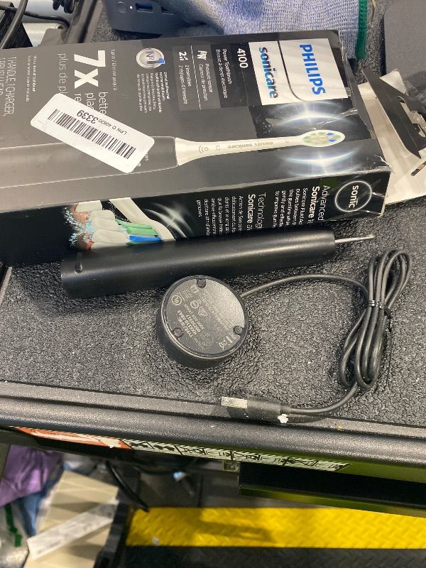 Photo 1 of **Missing Part - Brush Head Missing**
Philips Sonicare 4100 Rechargeable Electric Toothbrush, with Pressure Sensor, 2 Intensity Settings, SmarTimer and QuadPacer, 14-Day Battery Life, Black, Model HX3681/24