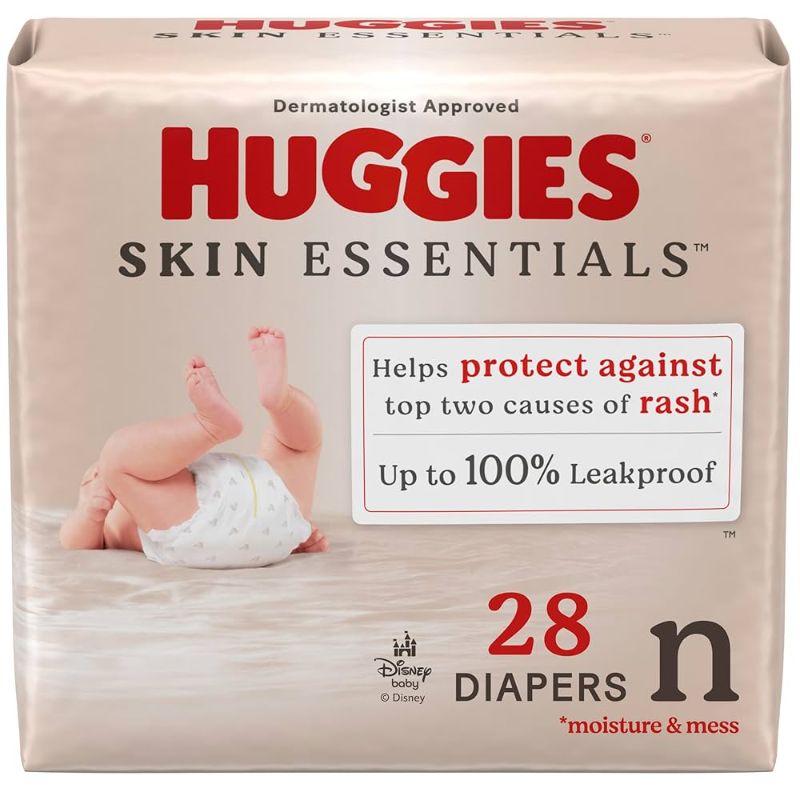 Photo 1 of **56 COUNT** Huggies Size Newborn Diapers, Skin Essentials Baby Diapers, Size Newborn (6-9 lbs), 56 Count, Packaging May Vary