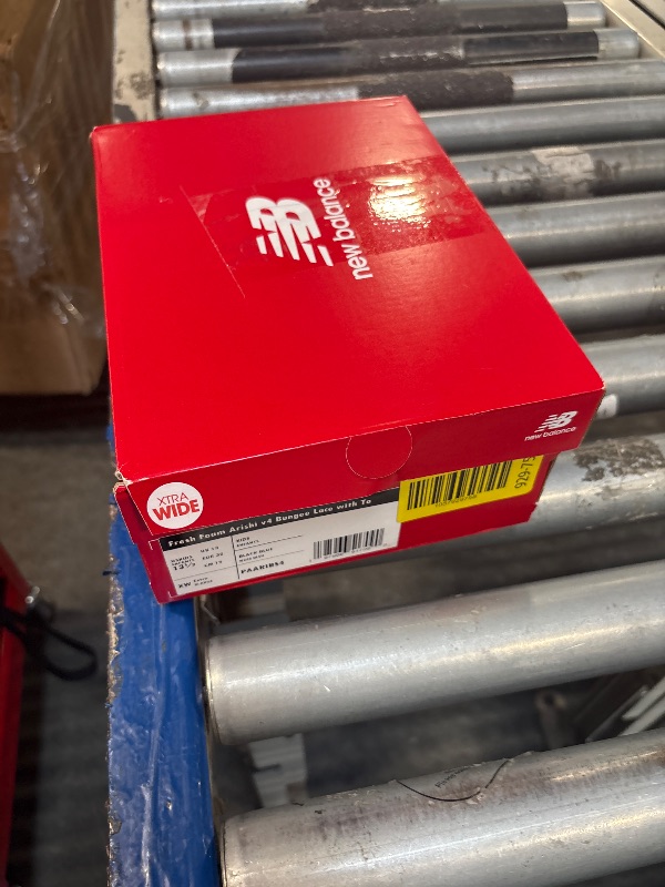 Photo 1 of **NEED TO BE CLEANED** New Balance Fresh Foam Arishi V4 Bungee Lace with Top Strap Running Shoe, Black/Blue Agate/Blaze Orange, 13.5 X-Wide US Unisex Little_Kid