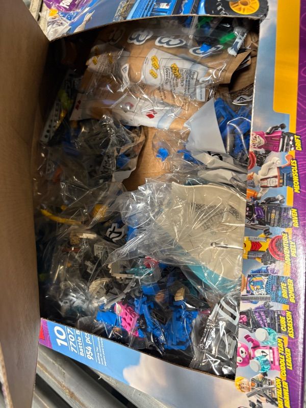 Photo 1 of **new but damaged box**LEGO Fortnite Battle Bus - Collectible Fortnite Toy for Kids, Boys and Girls, Ages 10+ - Pretend Play Set with 9 Minifigures from Video Game - Gift Ideas for Fans - 77073