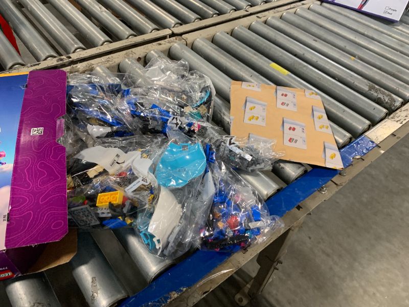 Photo 1 of **new but damaged box**LEGO Fortnite Battle Bus - Collectible Fortnite Toy for Kids, Boys and Girls, Ages 10+ - Pretend Play Set with 9 Minifigures from Video Game - Gift Ideas for Fans - 77073