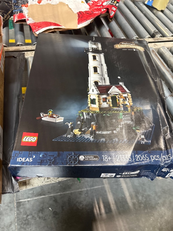Photo 1 of **damaged box**
LEGO Ideas Motorized Lighthouse 21335 Adult Model Building Kit, Complete with Rotating Lights, Quaint Cottage and a Mysterious Cave, Creative Gift Idea