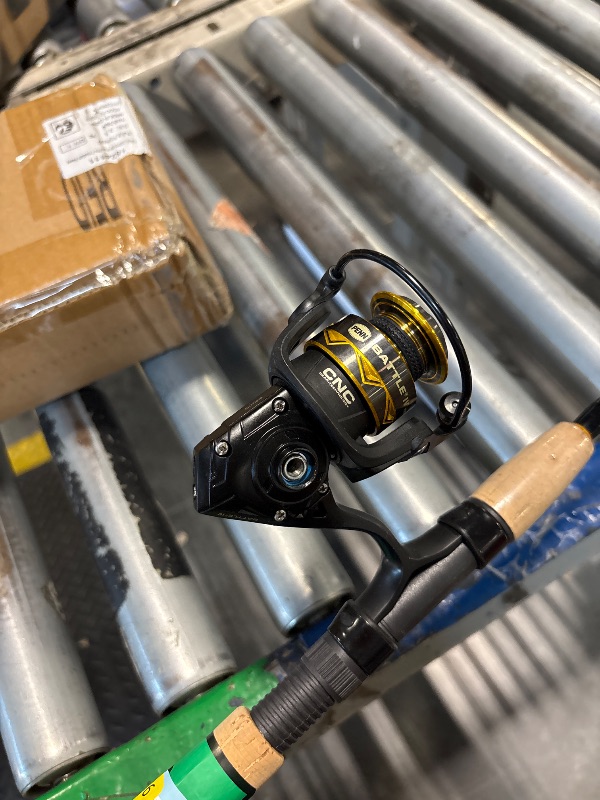 Photo 1 of *Missing handle for reel**
PENN 6'6" Battle IV Spinning Fishing Rod and Reel Combo Kit, 1000 Reel, CNC Gear Technology, Full Metal Body and Sideplate, HT-100 Drag System