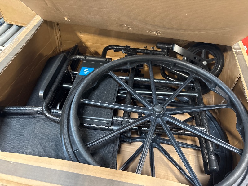 Photo 1 of **MISSING BOTH FOOT RESTS**
Medline Comfortable Folding Wheelchair with Swing-Back, Desk-Length Arms and Elevating Footrests, 20”W x 16”D Seat