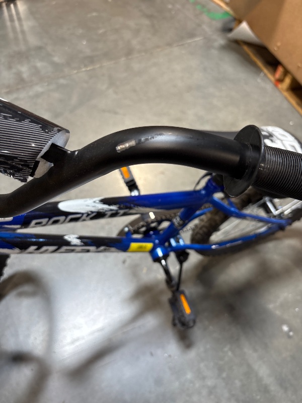 Photo 1 of **MINOR SCRATCHES**
Huffy 20" Rock It Kids' Bike, Fits Riders 44"-56", Blue, Child, Boys
