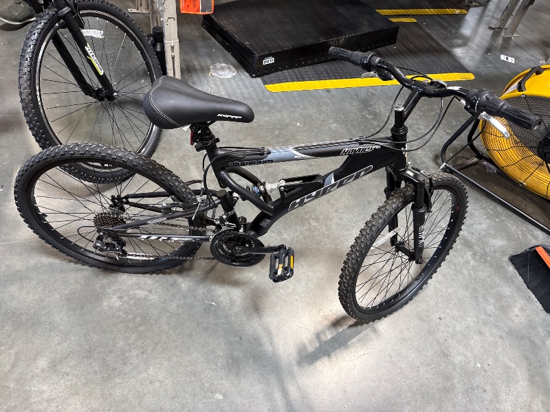 Photo 1 of **MINOR SCRATCHES & BOTH TIRES ARE FLAT**
24" Hyper Bicycles Havoc Mountain Bike, Youth/Adult, Recommended Ages 10-14 Years Old, Black
