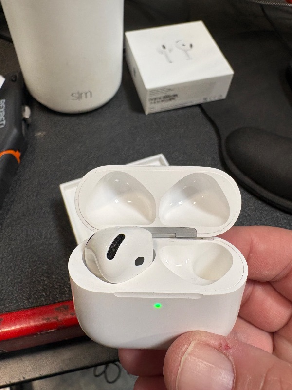 Photo 1 of **missing 1 earbud**
Apple AirPods 4 Wireless Earbuds, Bluetooth Headphones, Personalized Spatial Audio, Sweat and Water Resistant, USB-C Charging Case, H2 Chip, Up to 30 Hours of Battery Life, Effortless Setup for iPhone