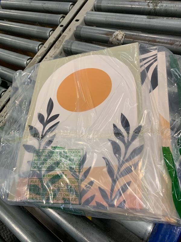 Photo 1 of ** RETAIL PRICE $30.00** 
3 Pcs Mid Century Modern Boho Sun Canvas Wall Art Neutral Abstract Minimalism Bohemian Mountains Plants Pictures Wall Decor Posters Prints Artwork for Bedroom Living Room Home Decoration