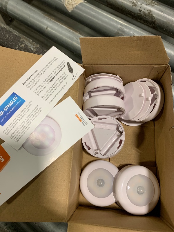 Photo 1 of ***SEE CLERK NOTES***EZVALO Under Cabinet Lighting with Charging Station,1000mAh Rechargeable Puck Lights with Remote, 3 Color Temps & 12 RGB Closet Lights, Dimmable Motion Sensor Lights for Shelf, Kitchen (6 Packs)