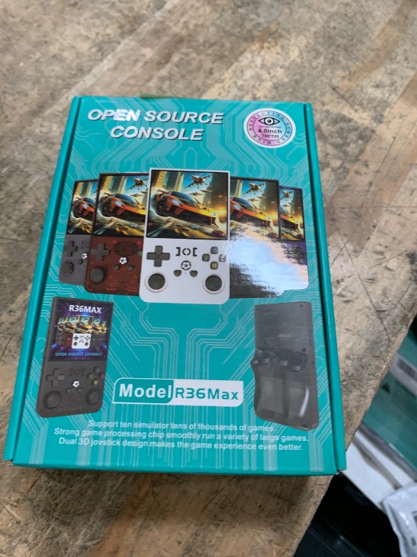 Photo 2 of R36MAX Handheld Retro Game Console,Retro Video Game Console Built-in Games,4.0 inch IPS Screen,Linux System with Professional Gaming Chip,4000mAh Rechargeable Battery(Transparent Gray)