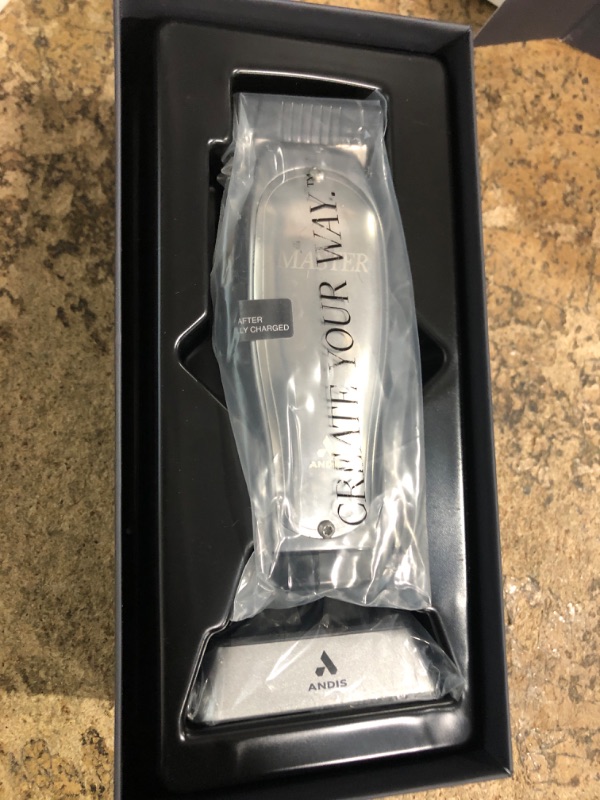 Photo 1 of **FOR PARTS ONLY/NON-FUNCTIONAL** Andis 12660 Professional Master Corded/Cordless Hair Trimmer, Adjustable Carbon Steel Blade Hair Clipper for Close Cutting, Silver