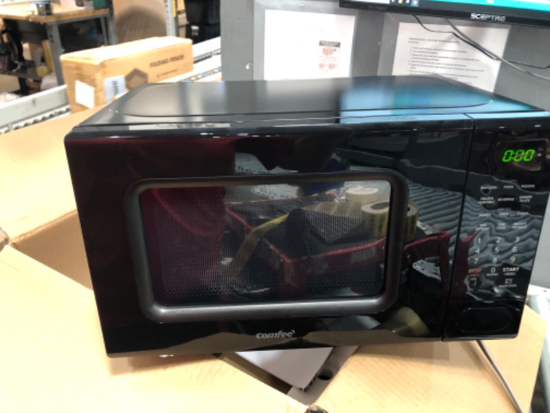 Photo 1 of *POWERS ON** COMFEE CMO-C20M1WB Countertop Microwave Oven, 0.7 cu.ft Small Microwave with 11 power levels,Turntable Reset Function, Speedy Cooking, Weight/Time Defrost, Memory function, Children Lock, 700W