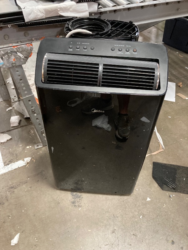 Photo 1 of ************SEE NOTES BEFORE BID*****************
Midea Duo 12,000 BTU (10,000 BTU SACC) High Efficiency Inverter, Ultra Quiet Portable Air Conditioner, Cools up to 450 Sq. Ft., Compatible with Alexa/Google Assistant, Includes Remote