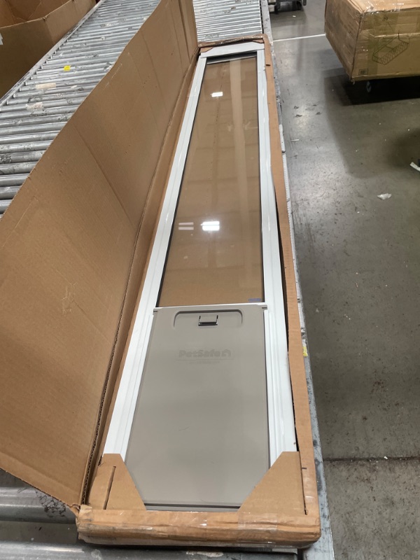 Photo 1 of (missing screws) PetSafe Sliding Glass Pet Door - No-Cut DIY Install Doggy Door for Renters - Aluminum Frame - Adjustable Height 75 7/8" to 81" - Ideal for Medium Dogs Up to 40 lb - White