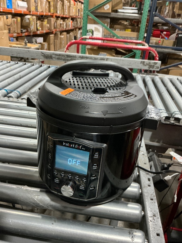 Photo 1 of Instant Pot Pro 10-in-1 Pressure Cooker, Slow Cooker, Rice/Grain Cooker, Steamer, Sauté, Sous Vide, Yogurt Maker, Sterilizer, and Warmer, Includes App With Over 800 Recipes, Black, 6 Quart