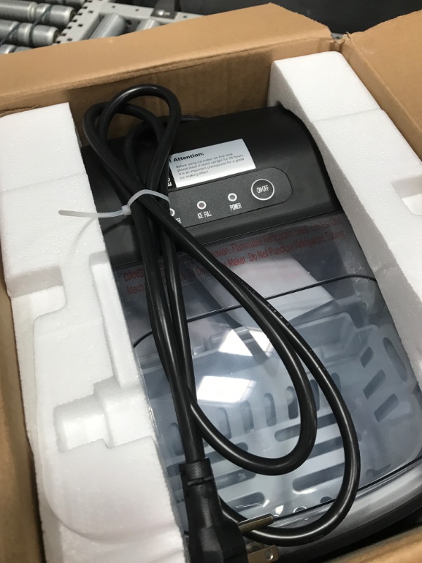 Photo 1 of ***(HEAVILY USED/ MINOR DAMAGE/ UNABLE TO TEST FULLY)***EUHOMY Countertop Ice Maker Machine with Handle, 26lbs in 24Hrs, 9 Ice Cubes Ready in 6 Mins, Auto-Cleaning Portable Ice Maker with Basket and Scoop, for Home/Kitchen/Camping/RV. (Black)