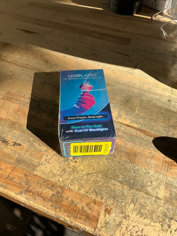 Photo 1 of **FACTORY SEALED** Loop Lasso NANO Glow in the Dark Rave Toys with Built-in UV Blacklight - Interactive Rope Launcher STEM Toy - Viral Flow and String Shooter Toy for Kids and Adults